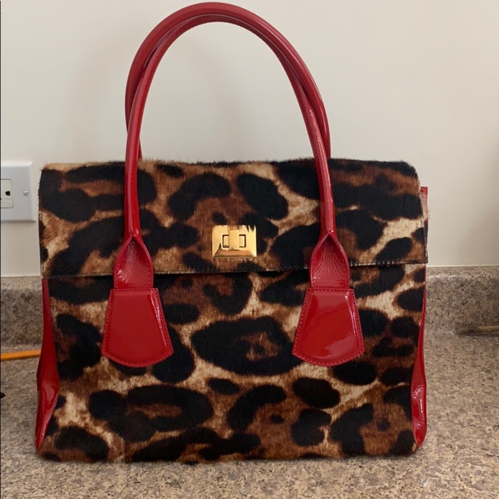 Real fur and patent leather purse